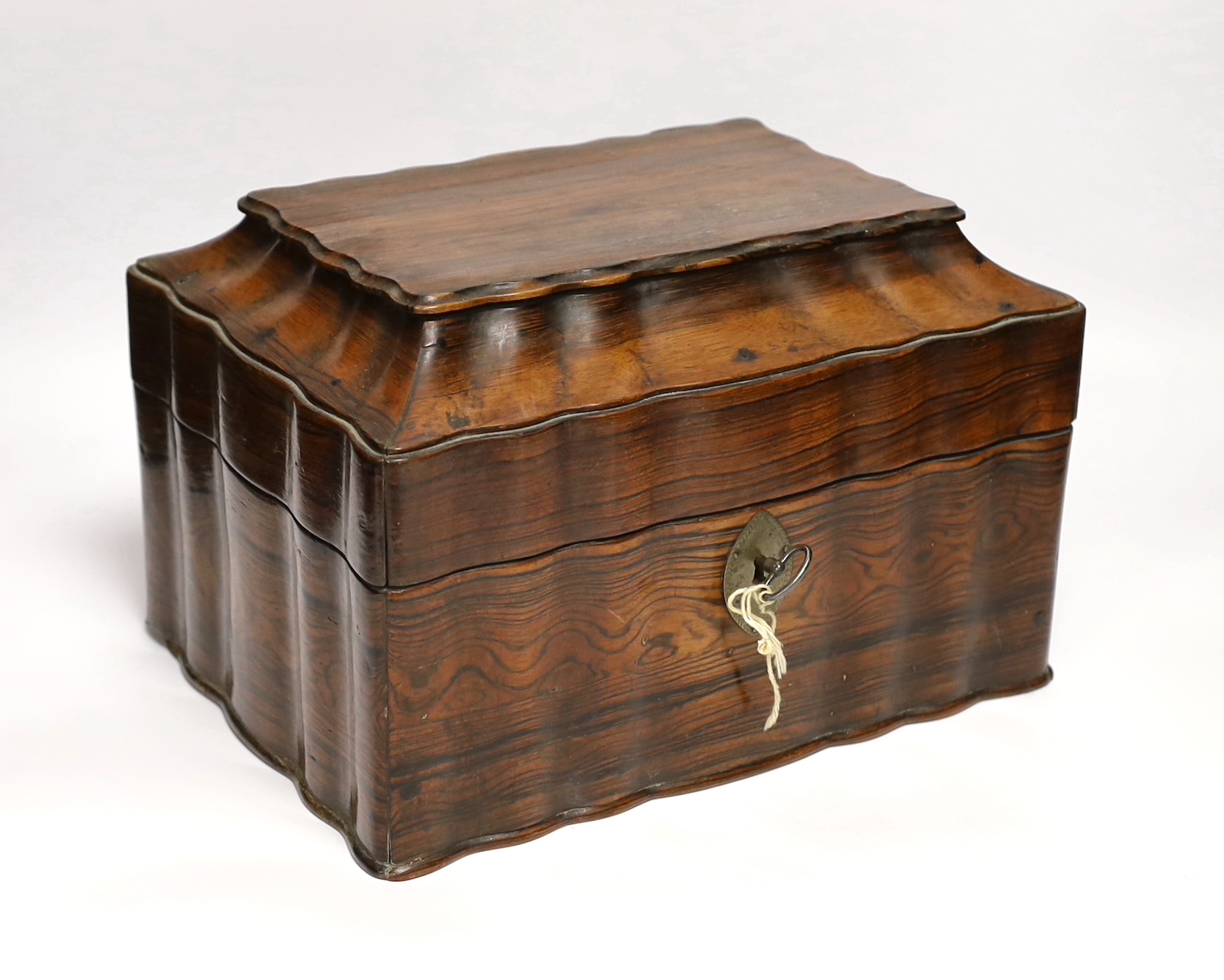 A Ceylonese calamander tea caddy, c.1820, with four internal compartments and key, 29cm wide